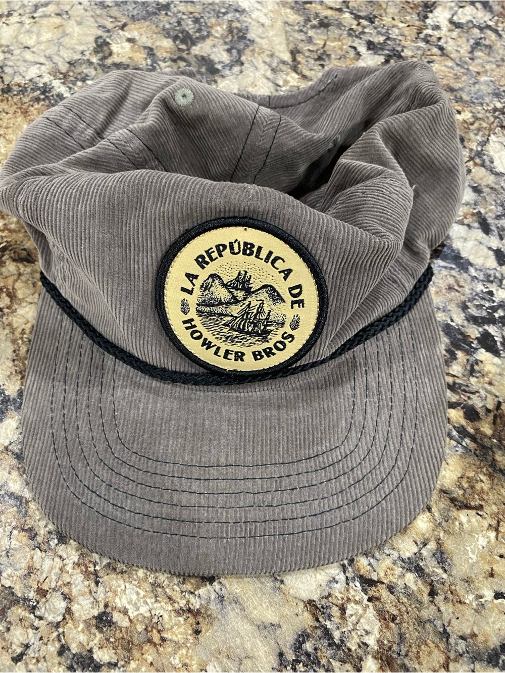 Howler Bros corduroy cap in brown with patch design adjustable snapback